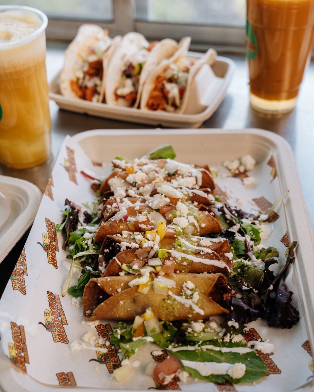 Quesa-taquitos with slow-braised red-sauce protein and cheese